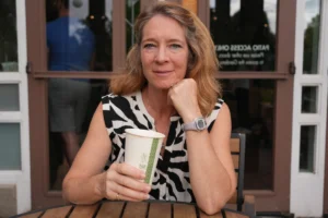 April, cofounder of MicroOffice Solutions drinking a coffee ( nearly her favorite thing!) at Denver Botanical Garden