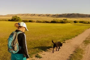 April, cofounder of MicroOffice Solutions , walking in Wyoming with a friend