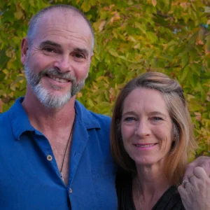 About Us - April and Dave in Wyoming with fall colors