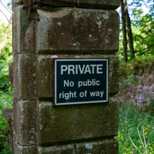 Private sign on garden